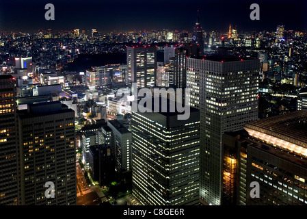 Night skyline view of Tokyo's endless urban sprawl and development near South Shinjuku, Tokyo, Japan Stock Photo