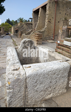 Drinking fountain on Cardo V, Herculaneum, UNESCO World Heritage Site, Campania, Italy Stock Photo