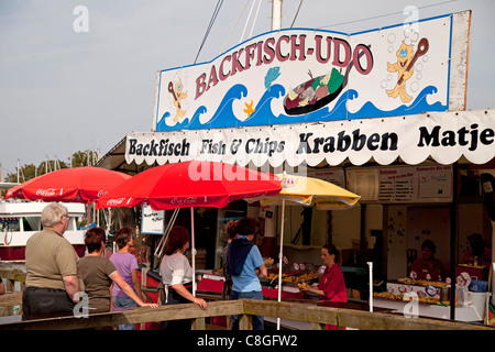 food stall with fish + chips and fish snacks in Warnemuende on the Baltic Sea, Rostock, Mecklenburg-Western Pomerania, Germany, Stock Photo