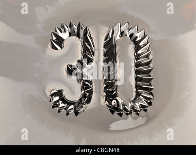 The number 30 thirty shown in ferro magnetic liquid Stock Photo