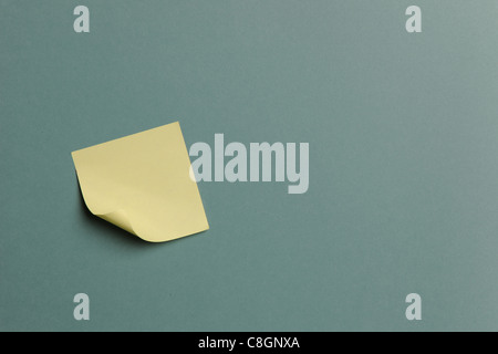 Sticky Note isolated on a green background Stock Photo