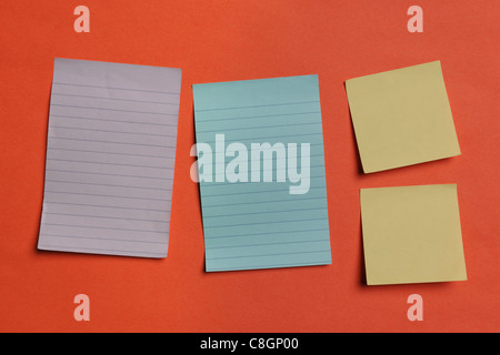 Colorful Notes on an orange Board Stock Photo