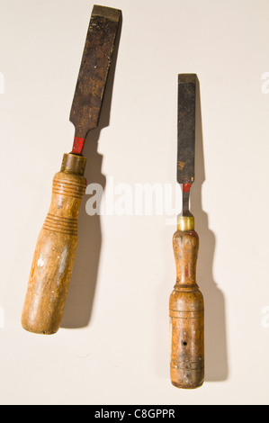 Old rusty wooden handled Chisels Stock Photo