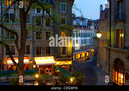 Geneva, Switzerland, Europe, canton Geneva, town, city, houses, homes, Old Town, restaurant, dusk, twilight, light, illumination Stock Photo