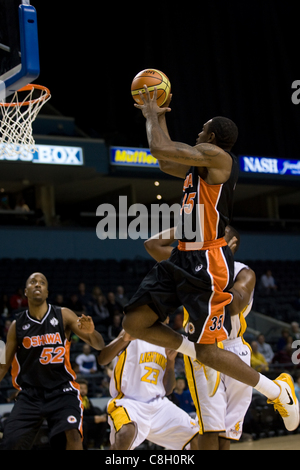 London Ontario, Canada - October 23, 2011. Akeem Wright of the Oshawa Power goes up for a basket in a National Basketball League of Canada game against the London Lightning. London won the game 111-83. Stock Photo