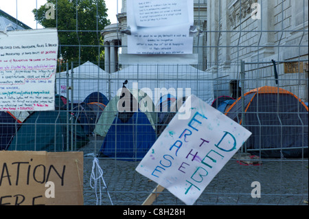 Placards or banners or posters at the anti Capitalist protest St.Paul's Cathedral, London Monday 24 October 2011 Stock Photo