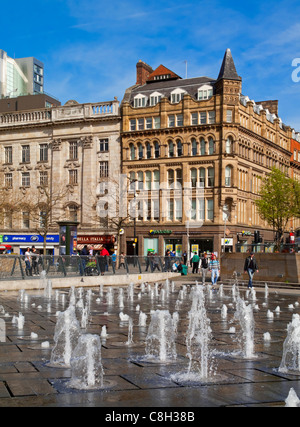 Fountains in Piccadilly Gardens a large public open space in the city centre of Manchester England UK Stock Photo