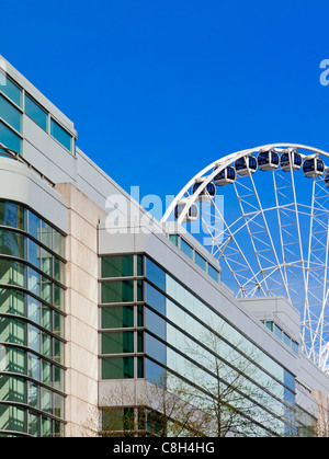 The Wheel of Manchester in the city centre with modern office building in the foreground Manchester England UK Stock Photo