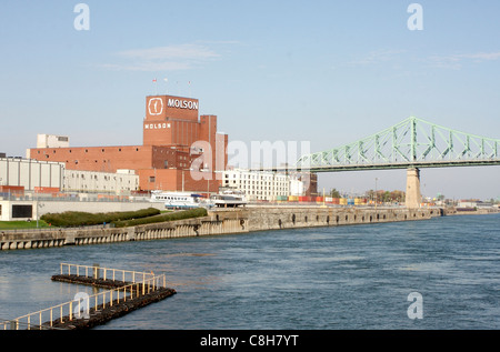 View of the Molson Brewery and Jacques Cartier Bridge from Old Montreal, Canada Stock Photo