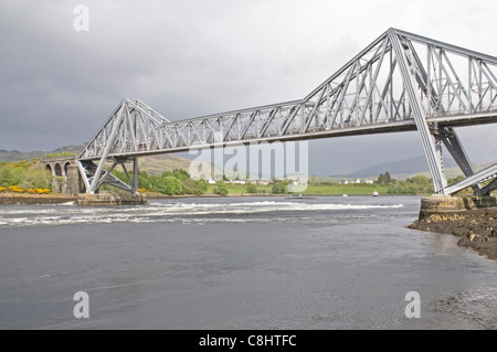 The Connel Bridge crossing the often turbulent tidal narrows, called the Falls of Lora, between Loch Etive and Firth of Lorne Stock Photo