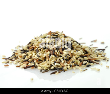 Dry wild rice mix heap on the wood background Stock Photo - Alamy