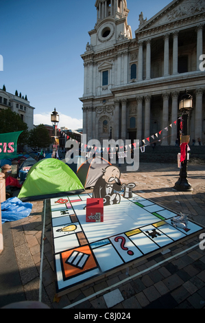 Anti capitalist protest camp and spoof Monopoly board game outside St Paul's Cathedral in the City of London, UK, on Tuesday, 25th October, 2011. Stock Photo