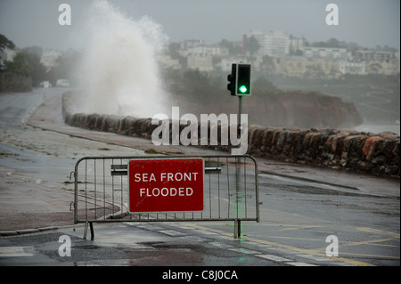 Torquay sea front is closed due to flooding caused by huge waves. Stock Photo