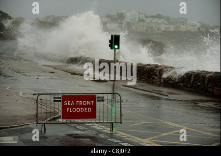 Torquay sea front is closed due to flooding caused by huge waves. Stock Photo