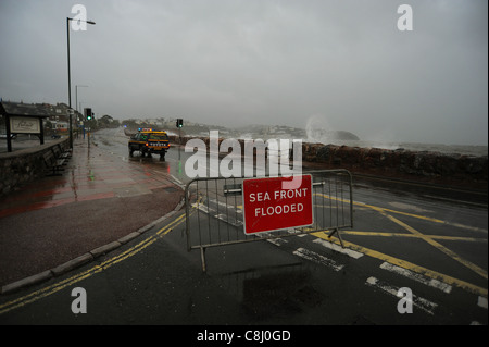 Torquay sea front is closed due to flooding caused by huge waves. Stock Photo