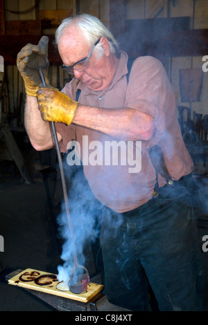 Blacksmith demonstration at Old Town San Diego State Historic Park, California, USA. Stock Photo