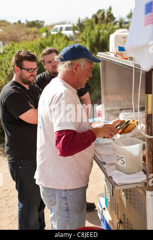 Bill Connell serves a variety of hot dogs at Surf Dog, Carpinteria, California, United States of America Stock Photo