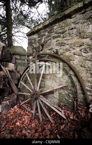An old Penny Farthing left rusting by a garden wall UK Stock Photo - Alamy