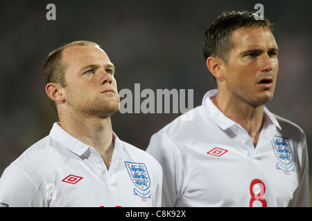 England players Wayne Rooney (L) and Frank Lampard (R) stand for team introductions before a FIFA World Cup match v. the USA. Stock Photo