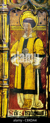 Ludham, Norfolk, rood screen, St. Stephen holding stones of his martyrdom male saint saints English medieval screens painting Stock Photo