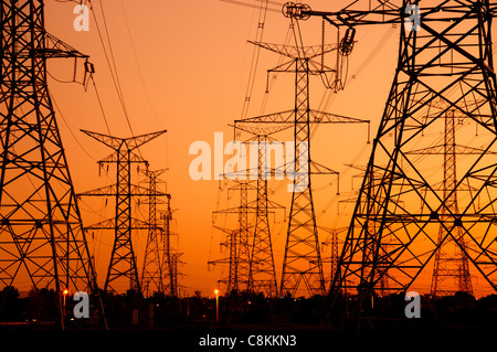 Power lines and towers at sunset in Toronto Canada Stock Photo