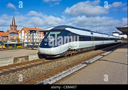 Ansaldo Breda made Danish State Railways IC4 train  leaving Vejle Railway Station for Copenhagen in Denmark Stock Photo