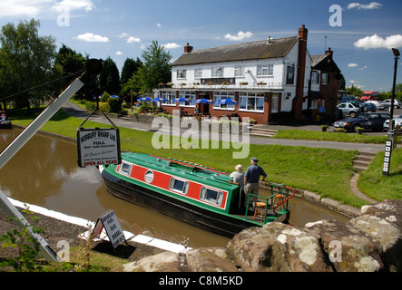 Canal boat on Shropshire Union Canal at Norbury Junction, Staffordshire, UK Stock Photo