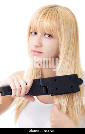 Blonde Woman with Hair Straightener Isolated on White Stock Photo