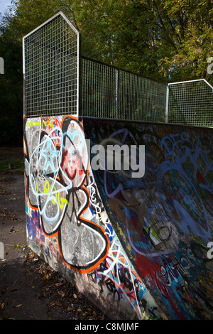 Graffiti covered skateboarding ramp Stock Photo