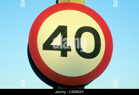 40 MPH Speed Limit Sign, UK England English motoring speed restriction roadside signs forty miles per hour limits Britain Stock Photo