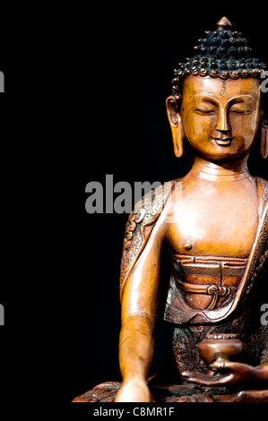 Buddha statue on Black background Stock Photo