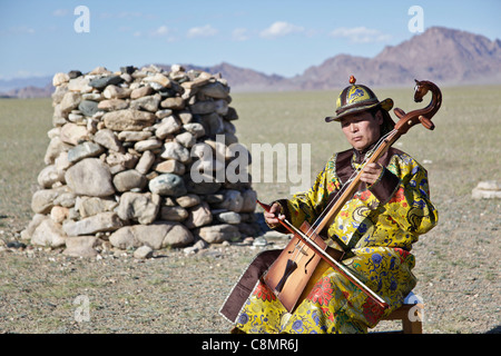 Musician playing the Morin khuur, the typical musical instrument of ...