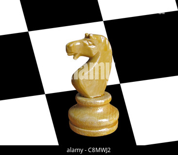wooden knight on chessboard Stock Photo