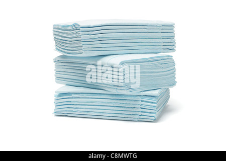 Stack of blue folded facial tissue papers on white background Stock Photo