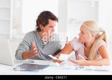 Couple arguing on expenses Stock Photo