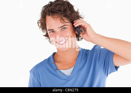 Handsome dark-haired guy on the phone Stock Photo