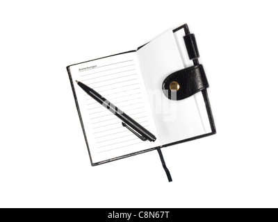 old-fashioned note book with pen, isolated on white Stock Photo