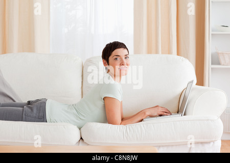 Short-haired woman with a laptop Stock Photo