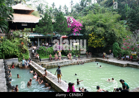 Visitors Enjoying The Sacred Hot Springs In Bali Stock Photo