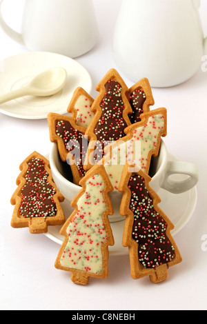 Vertical shot of cups with Christmas cookies Stock Photo - Alamy