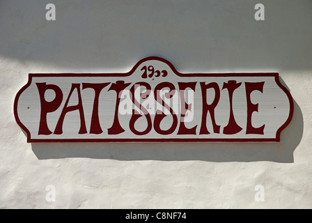 France, Pyrenees, Basque Country, Espelette, Patisserie sign