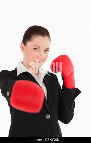 Pretty woman wearing some boxing gloves Stock Photo