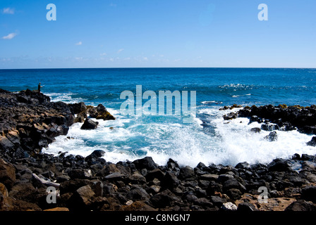 Rocky coastline near Poipu, near Brennecke's beach, south coast of Kauai Stock Photo