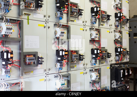 Electric service panel with many switches automatons and breakers Stock Photo