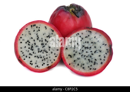 Pitaya (Hylocereus undatus), whole and section, showing seeds Stock Photo