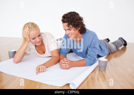Couple looking at a plan Stock Photo