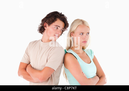 Unhappy couple standing back to back Stock Photo