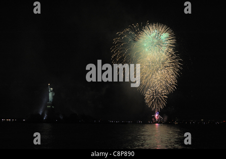 Fireworks at the Statue of Liberty in New York harbor celebrated the 125th anniversary of the unveiling of the statue on Oct. 28, 1886. Stock Photo