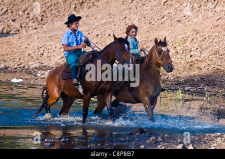 Participants in the annual festival 'Patria Gaucha' in Tacuarembo, Uruguay. Stock Photo