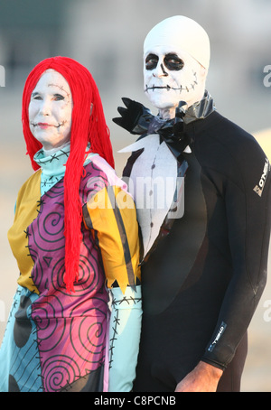SURFERS AS SALLY & JACK SKELLINGTON FROM NIGHTMARE BEFORE CHRISTMAS BLACKIE'S HALLOWEEN COSTUME SURF CONTEST 2011 ORANGE COUNTY Stock Photo